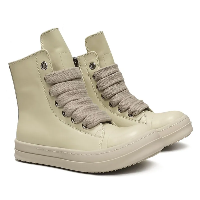 Black leather high-top sneakers with side zipper and round toe on a rubber platform sole