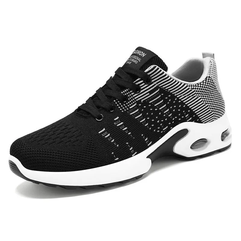 Men's low-top black and gray Flyknit mesh casual sneakers with lace-up front and round toe.