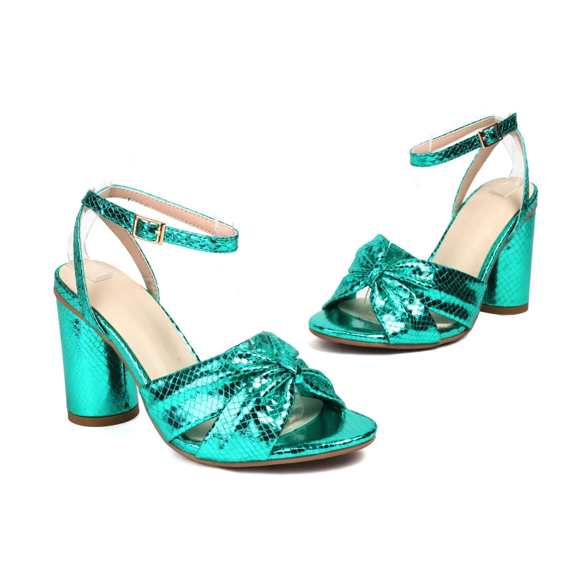 Gold women's plus-size high heel peep toe sandals with an ankle buckle strap on a white background.