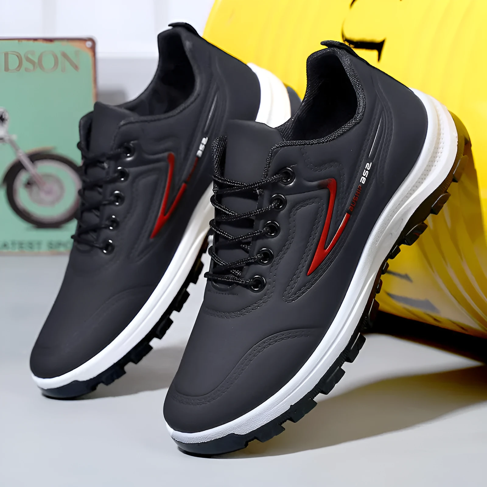 Waterproof leisure shoes with artificial PU upper in black and grey colour combination