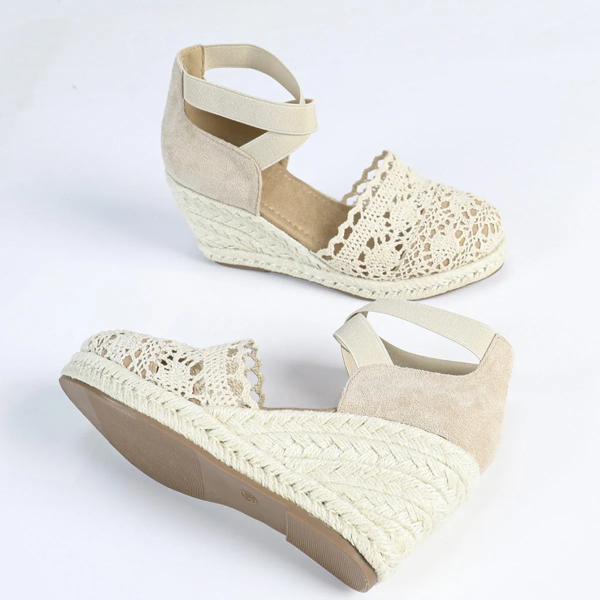 Women's canvas wedge sandals in Roman style with round toe, shown in apricot and black colour options