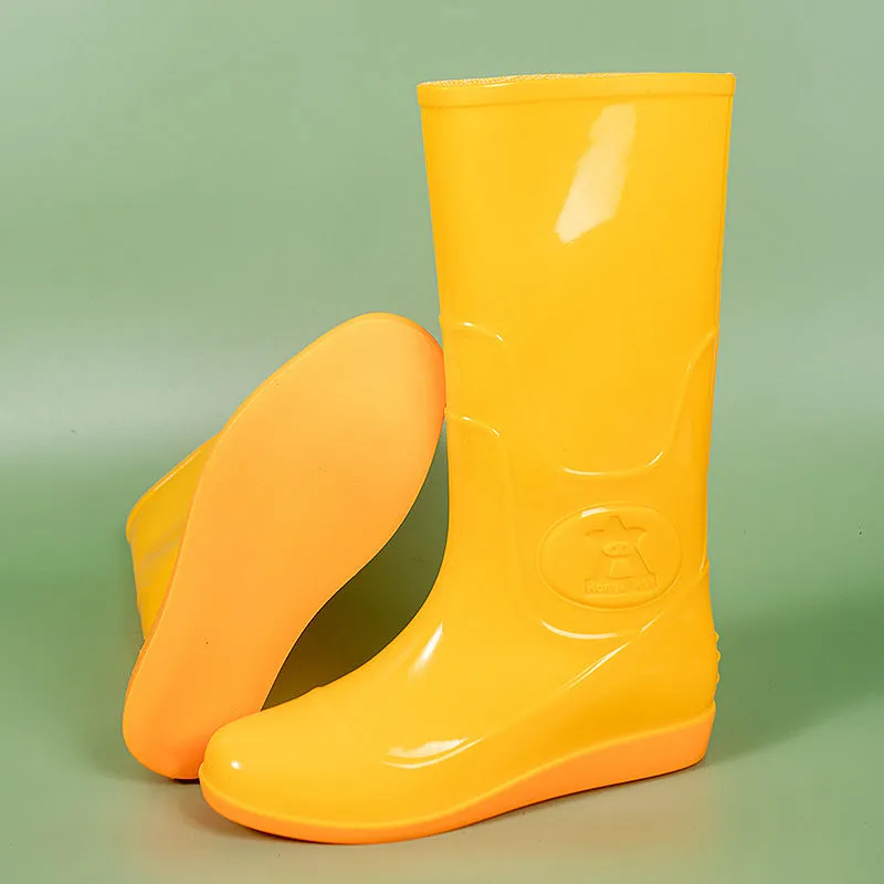 White plastic rain boots with high tube design and flat heel for outdoor labour protection