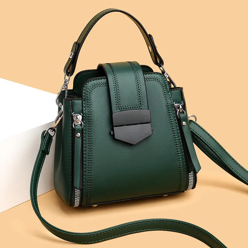 Small square vertical handbag in soft textured PU leather with zip closure and sewing thread detail