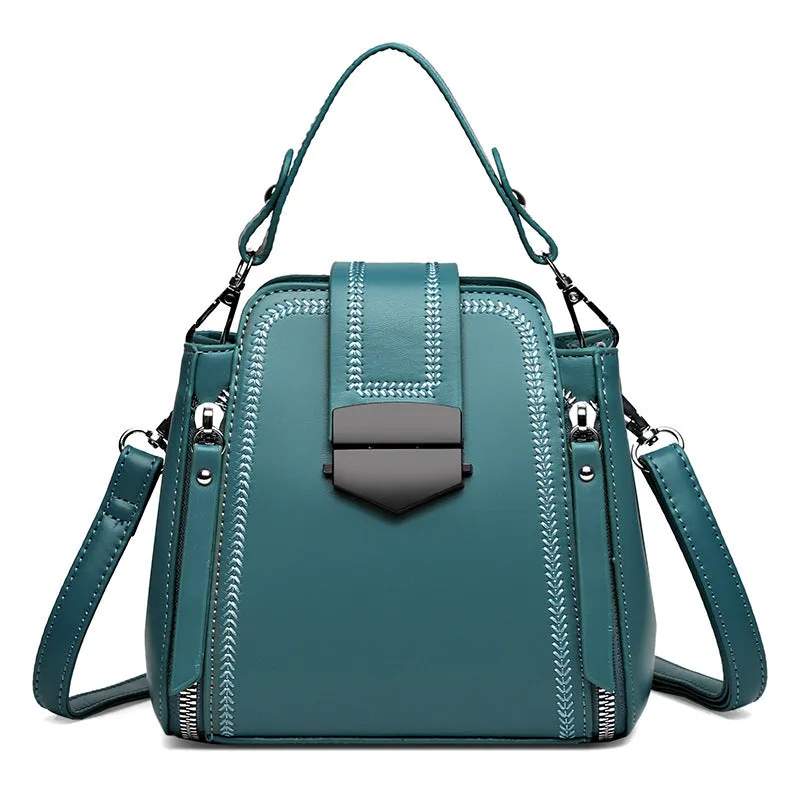 Small square vertical handbag in soft textured PU leather with zip closure and sewing thread detail