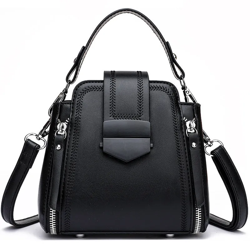 Small square vertical handbag in soft textured PU leather with zip closure and sewing thread detail