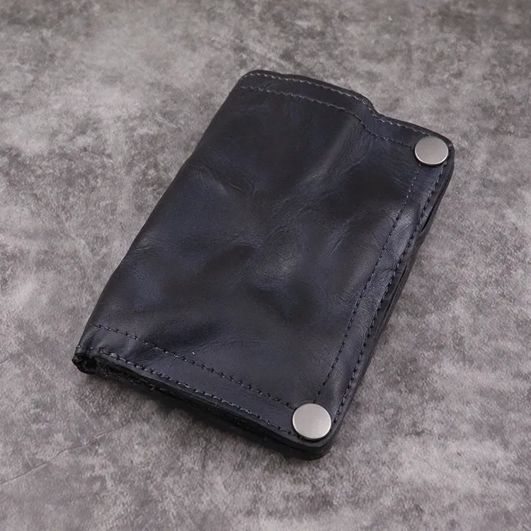 Men's brown leather bifold wallet open showing multiple card slots and coin pocket