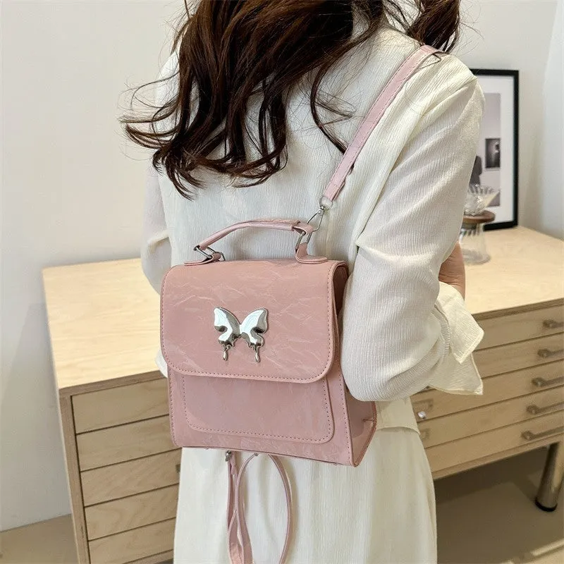 Women's preppy style PU hand-carry backpack with bow detail in light blue colour