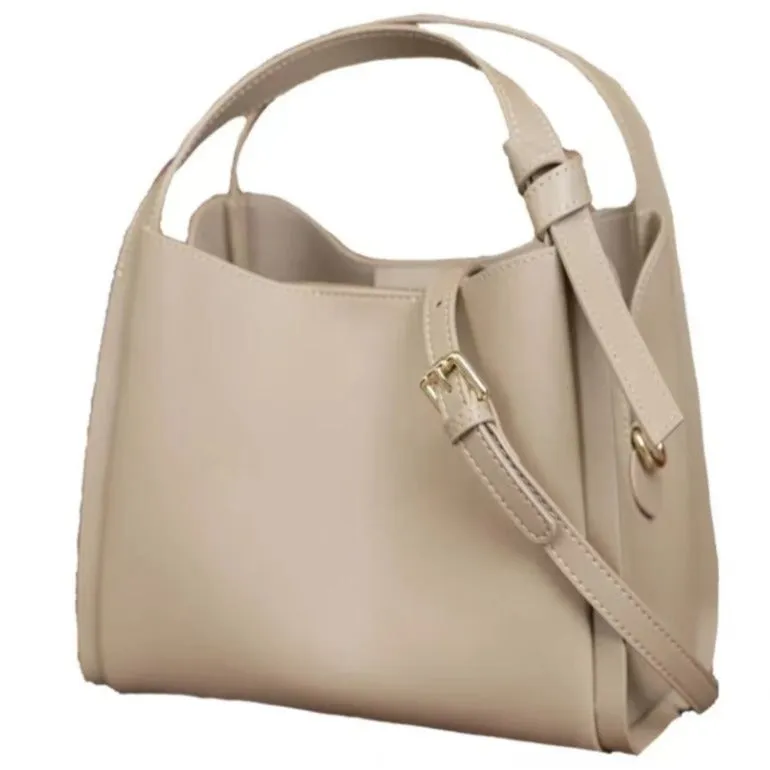 Genuine cowhide women's crossbody bucket bag showing internal zipper compartments and 25cm size
