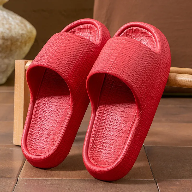 A pair of khaki coloured EVA toe ring slippers with a soft non-slip sole, shown on a white background.