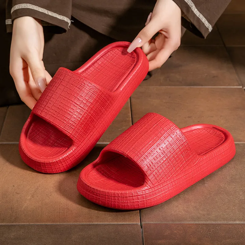A pair of khaki coloured EVA toe ring slippers with a soft non-slip sole, shown on a white background.