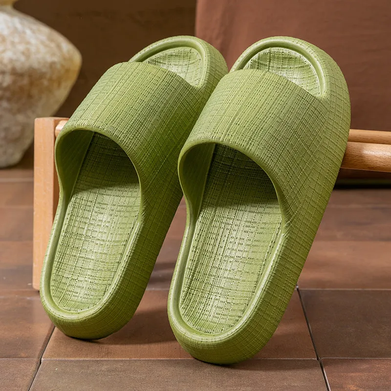 A pair of khaki coloured EVA toe ring slippers with a soft non-slip sole, shown on a white background.