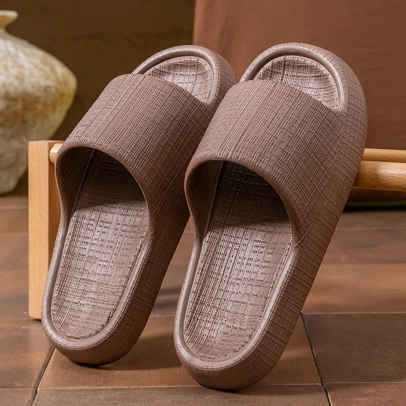A pair of khaki coloured EVA toe ring slippers with a soft non-slip sole, shown on a white background.
