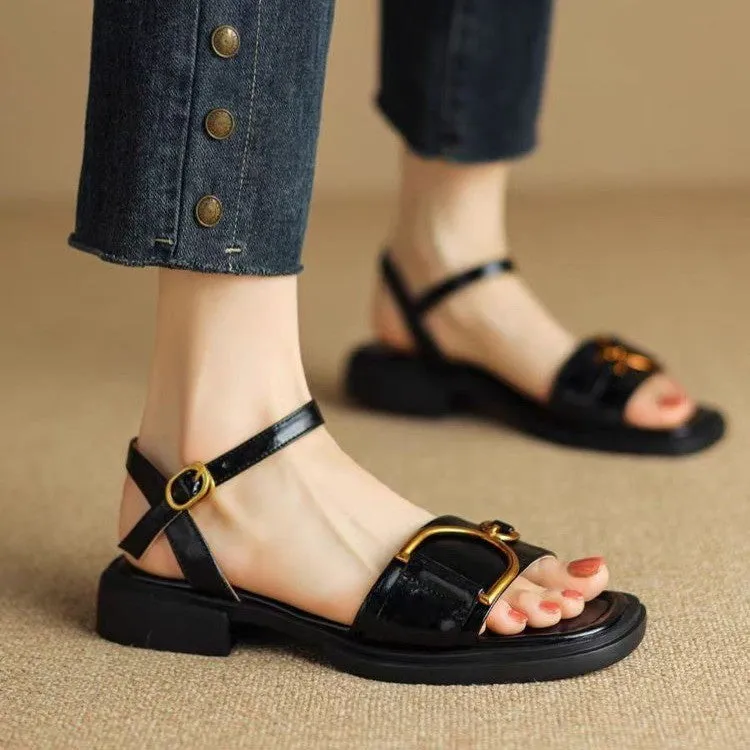 Women's beige leather sandals with a thick rubber sole and silver buckle fastening