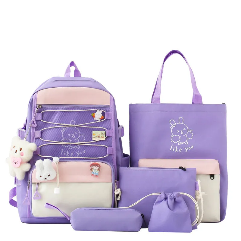 Lightweight large student backpack in black, blue, pink, and purple colour options.