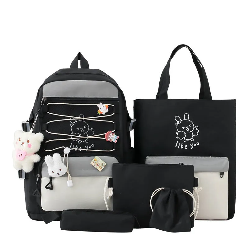 Lightweight large student backpack in black, blue, pink, and purple colour options.