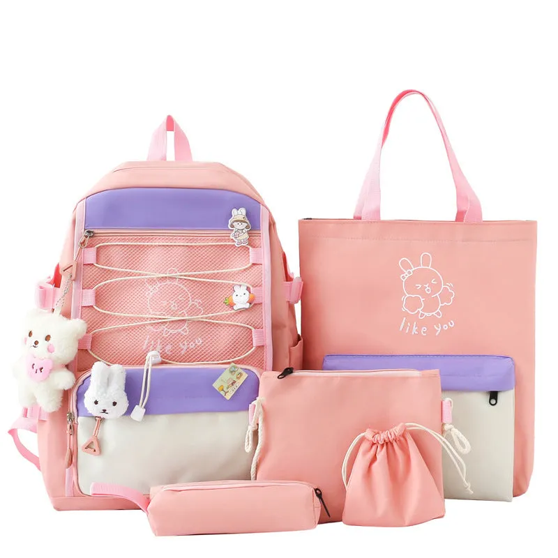Lightweight large student backpack in black, blue, pink, and purple colour options.