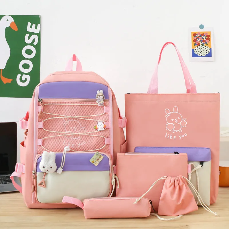 Lightweight large student backpack in black, blue, pink, and purple colour options.