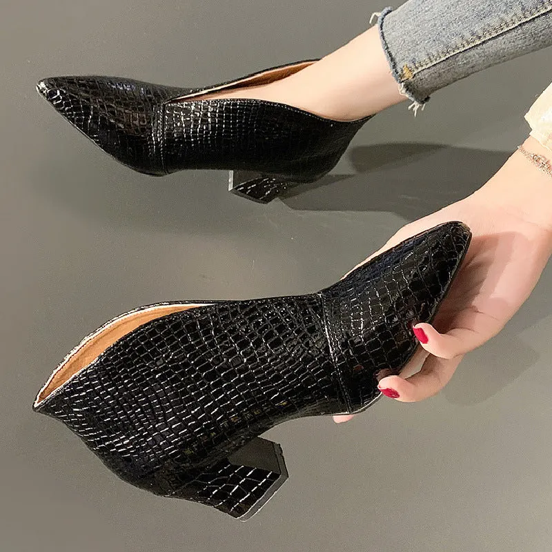 Women's black martin boots with pointed embossed toe and chunky heel