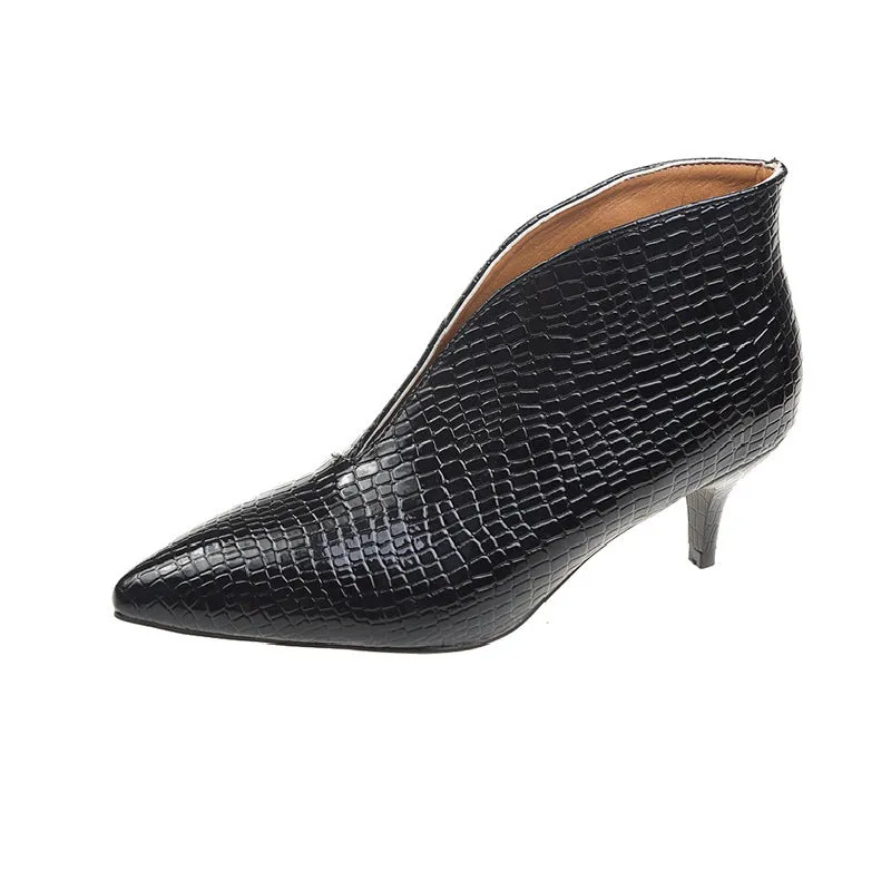 Women's black martin boots with pointed embossed toe and chunky heel