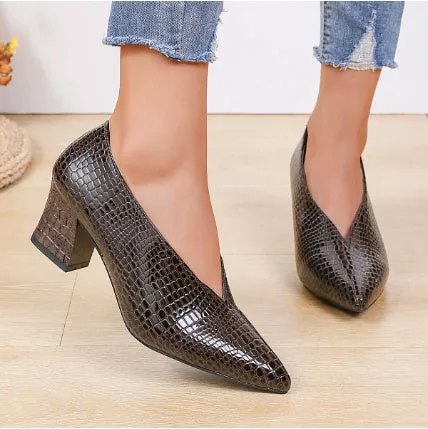 Women's black martin boots with pointed embossed toe and chunky heel