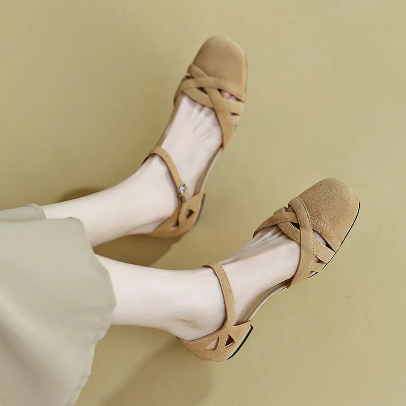 Apricot coloured classic Roman sandals with a buckle fastening and round toe on a rubber sole.