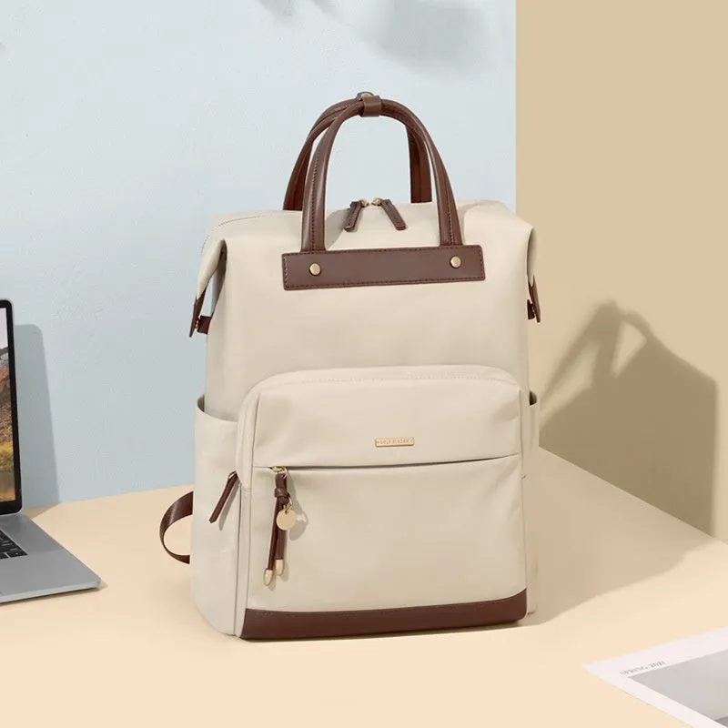 Large apricot coloured backpack with adjustable straps on a grey background