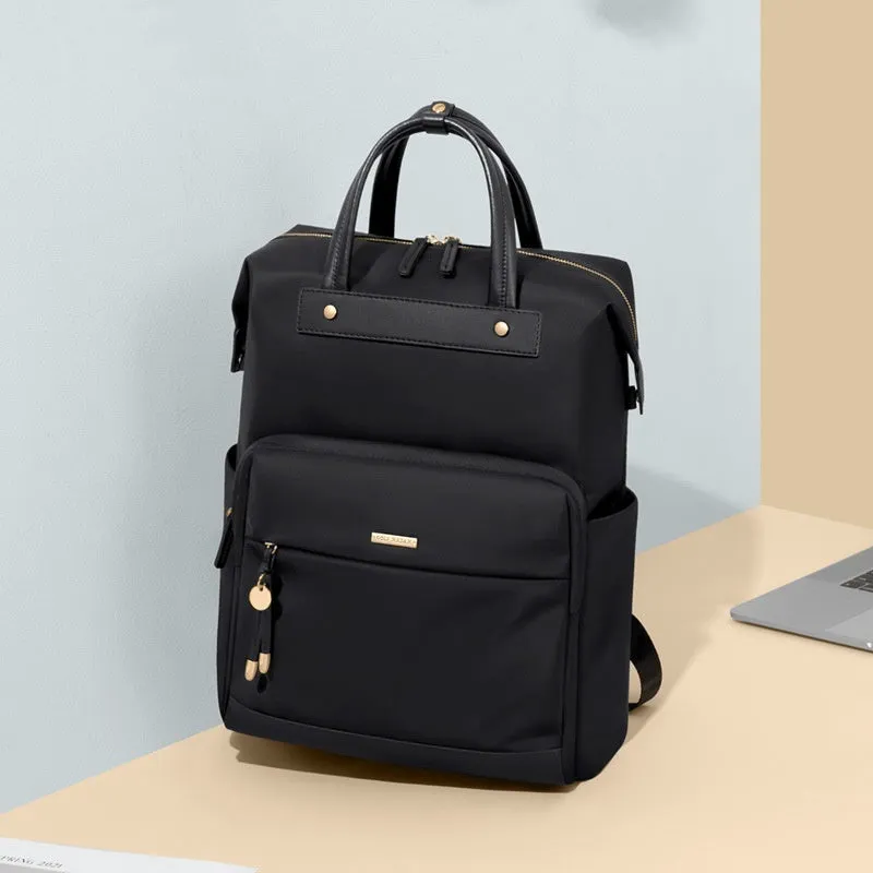 Large apricot coloured backpack with adjustable straps on a grey background