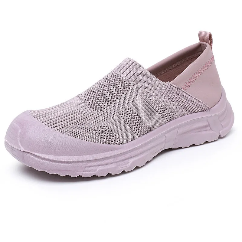 Women's black slip-on cloth shoes with round toe and soft PVC flat sole.
