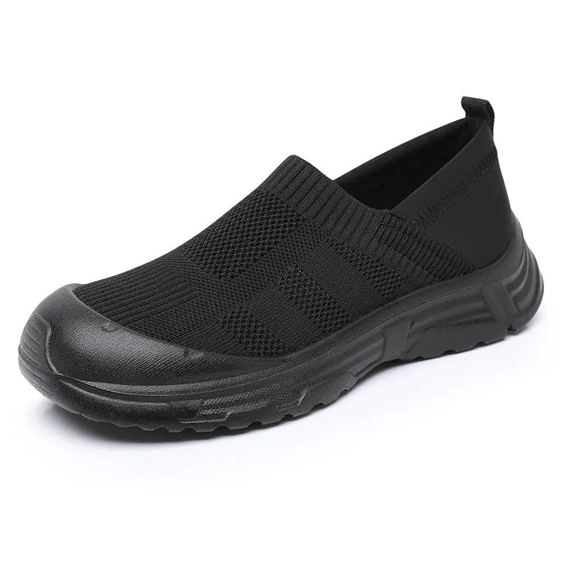 Women's black slip-on cloth shoes with round toe and soft PVC flat sole.