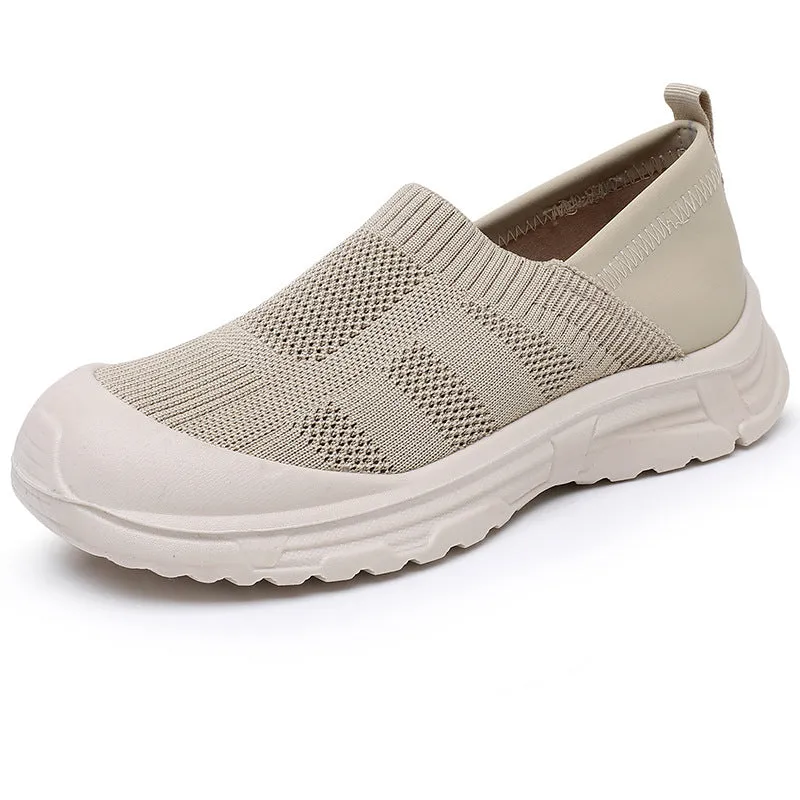 Women's black slip-on cloth shoes with round toe and soft PVC flat sole.