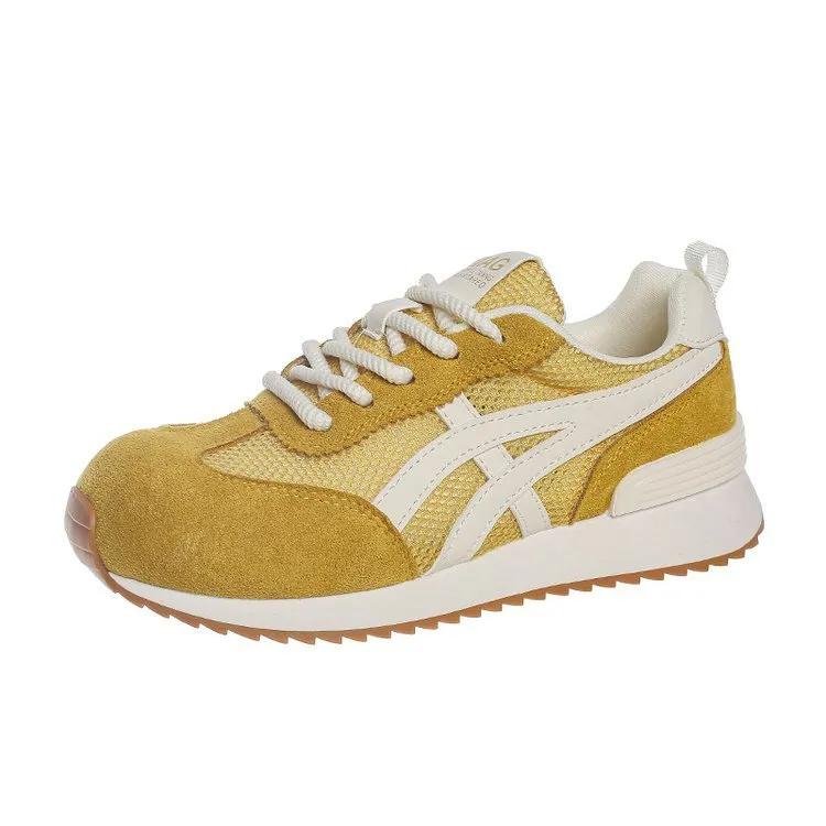 Women's white lace-up casual sneaker with round toe and flat non-slip sole.