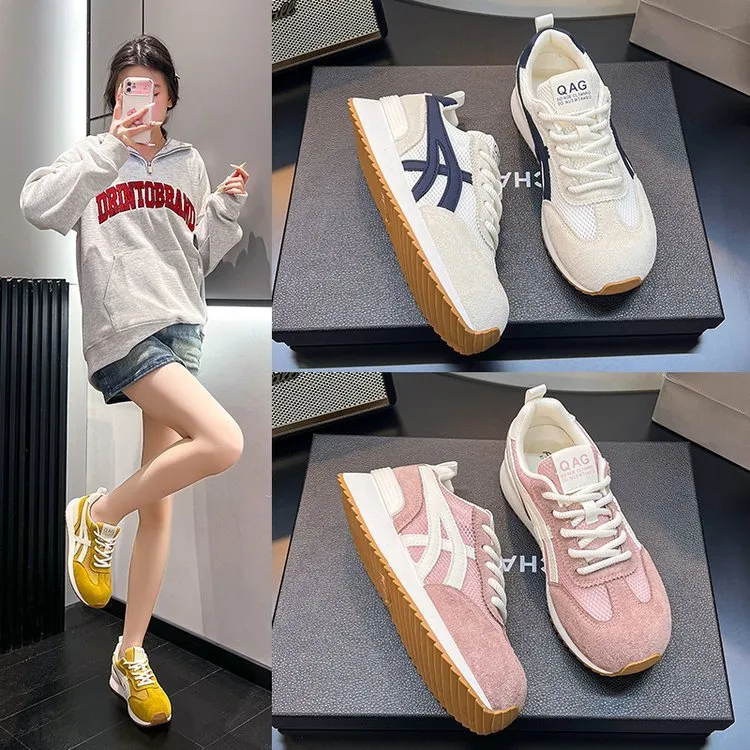 Women's white lace-up casual sneaker with round toe and flat non-slip sole.