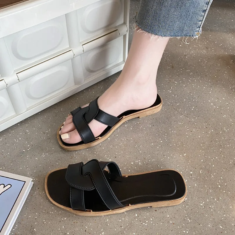 Women's PVC cross-strap sandals with toe ring design and non-slip soles in light blue colour