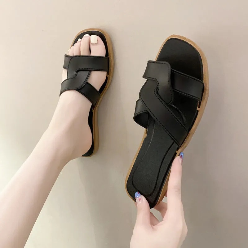 Women's PVC cross-strap sandals with toe ring design and non-slip soles in light blue colour
