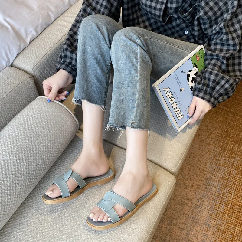 Women's PVC cross-strap sandals with toe ring design and non-slip soles in light blue colour