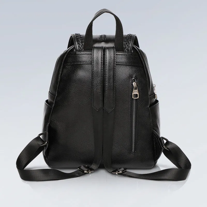Genuine leather blue women's backpack showing front sandwich pocket and street trend design.