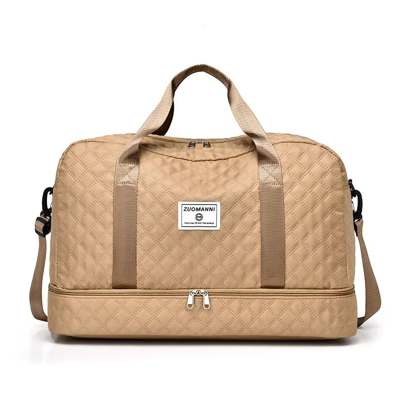Large oxford cloth travel bag in a solid colour with visible sewing thread details, shown with the main compartment open.