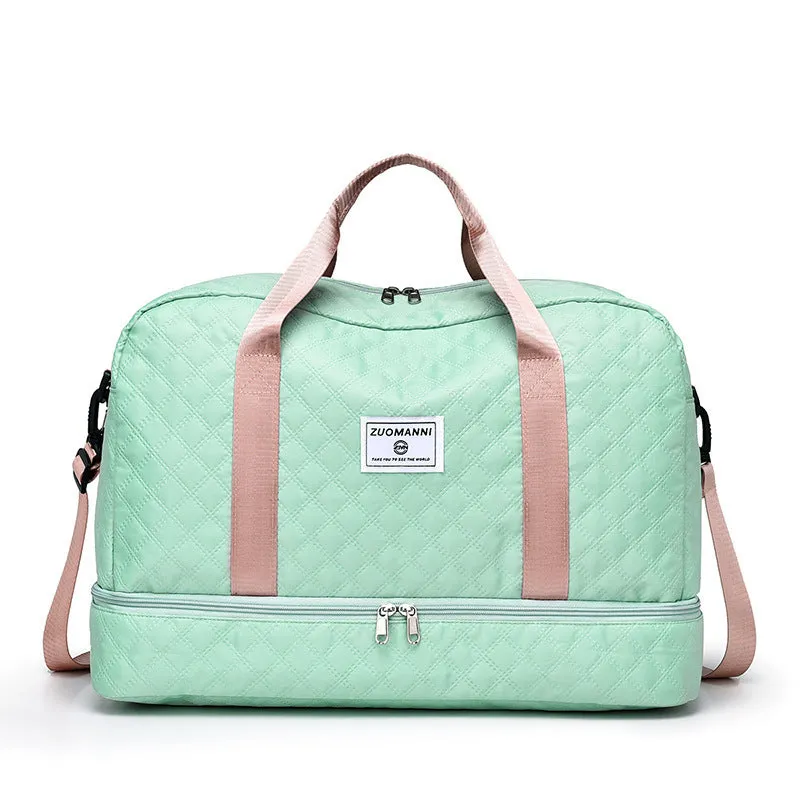 Large oxford cloth travel bag in a solid colour with visible sewing thread details, shown with the main compartment open.
