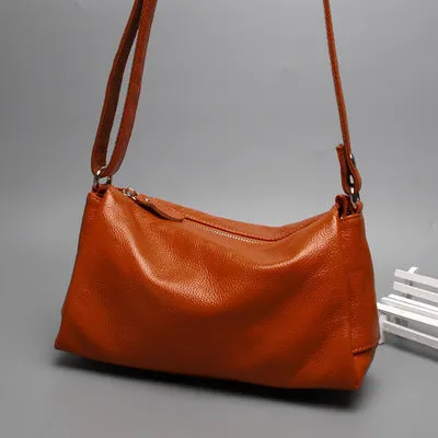 A soft genuine leather women's crossbody bag in a horizontal square shape, shown in one of four available colours.