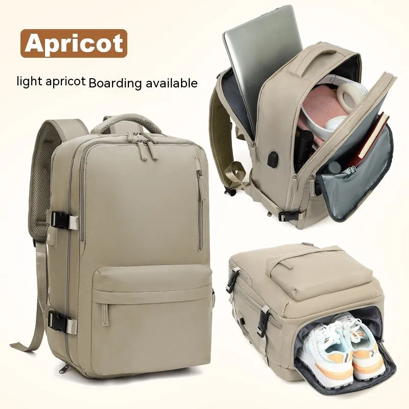 Large black waterproof mummy-style nylon backpack on a neutral background.
