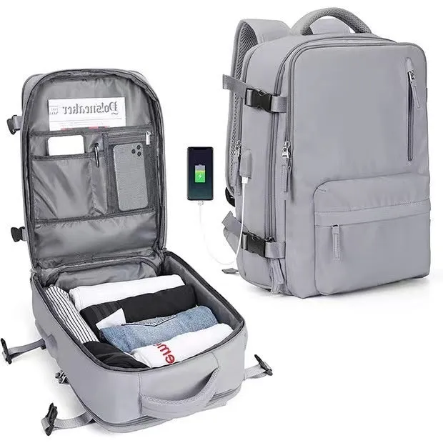 Large black waterproof mummy-style nylon backpack on a neutral background.