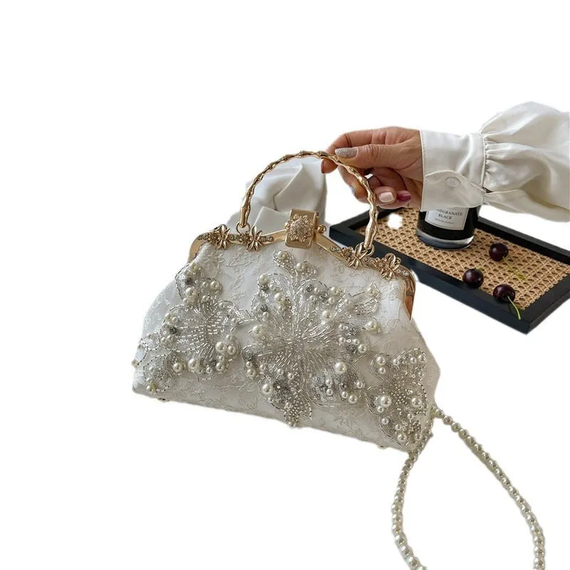 Pearl embroidered polyester handbag in horizontal square shape with double shoulder straps