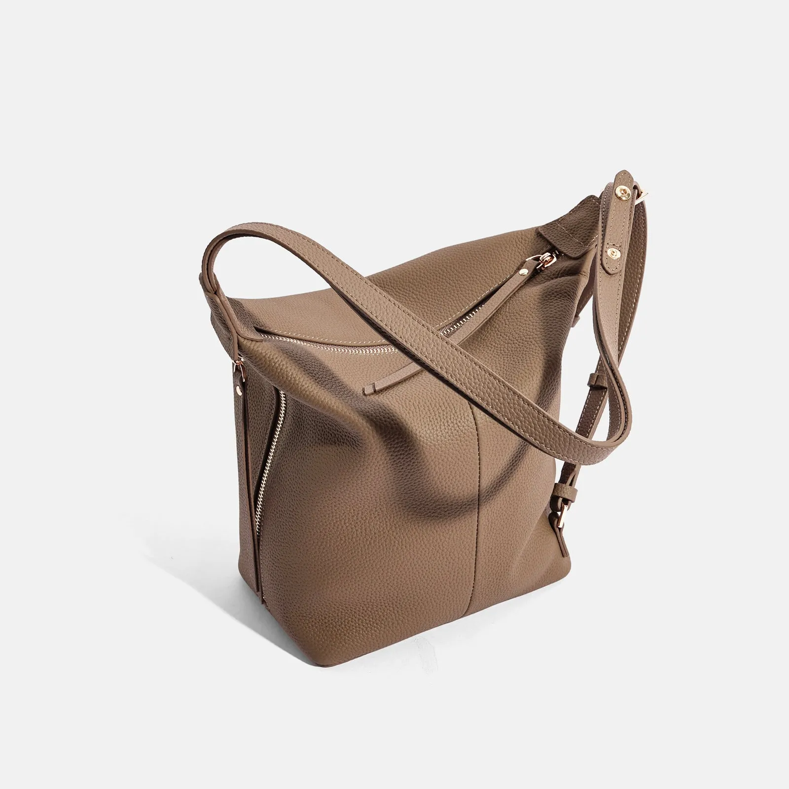 Women's genuine leather bucket shoulder bag in elephant grey colour showing soft construction