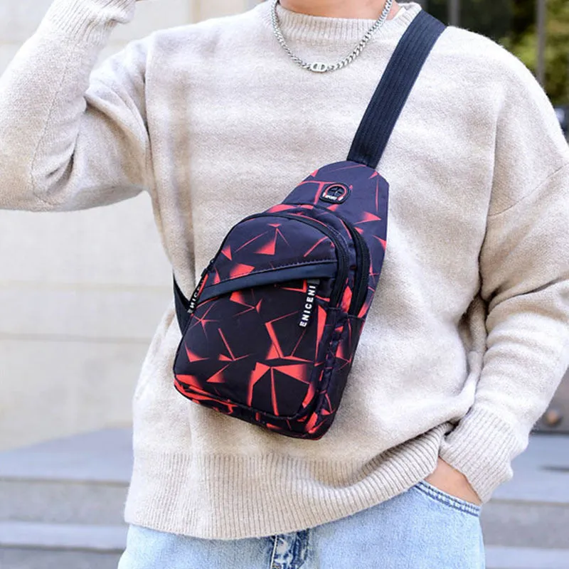 Men's blue crossbody sling bag with an earphone hole and zipper pocket.