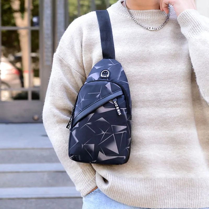 Men's blue crossbody sling bag with an earphone hole and zipper pocket.