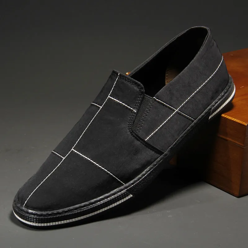 Men's slip-on canvas shoes in various colours showing round toe and low-top design