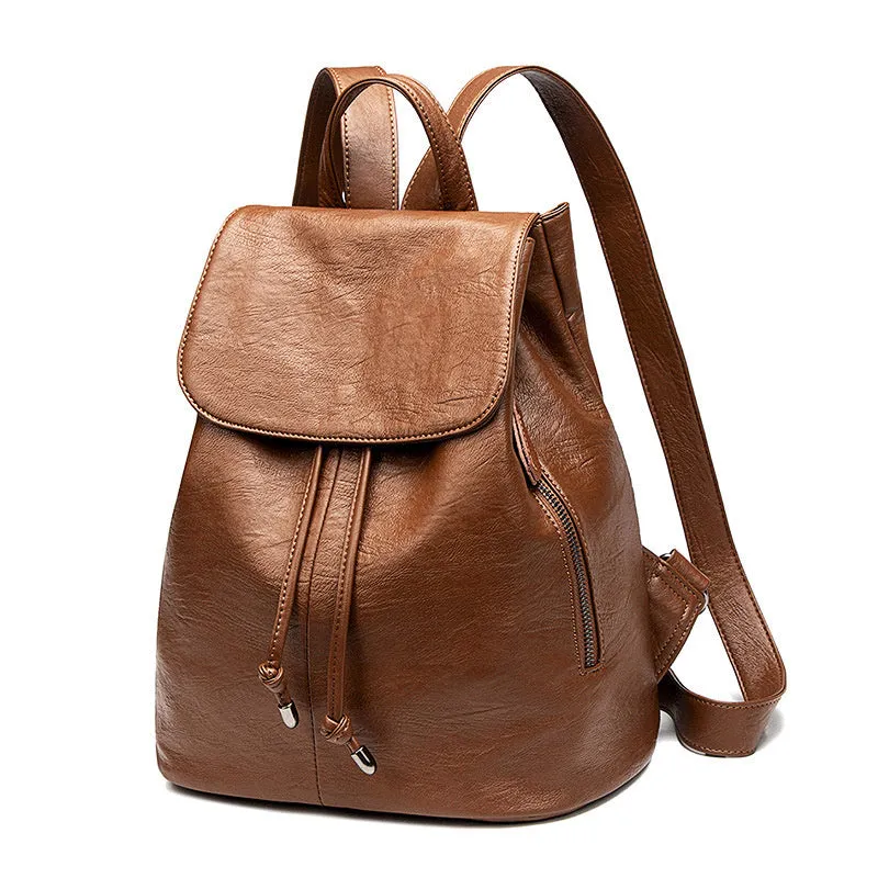 Black genuine leather women's backpack with multiple compartments and waterproof design