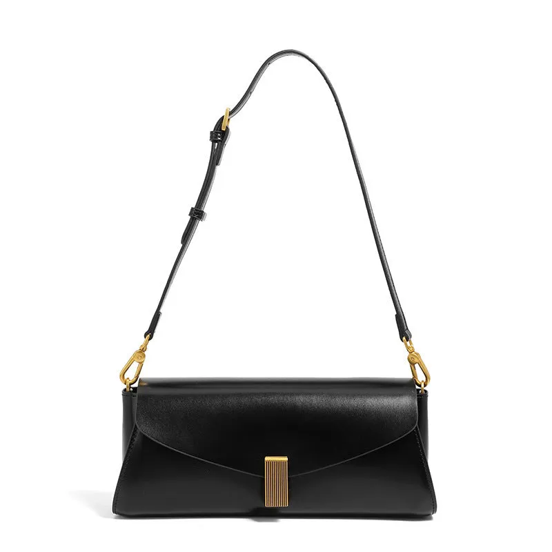 Women's leather cross-body bag with clamshell opening in milky white colour showing pillow-shaped design