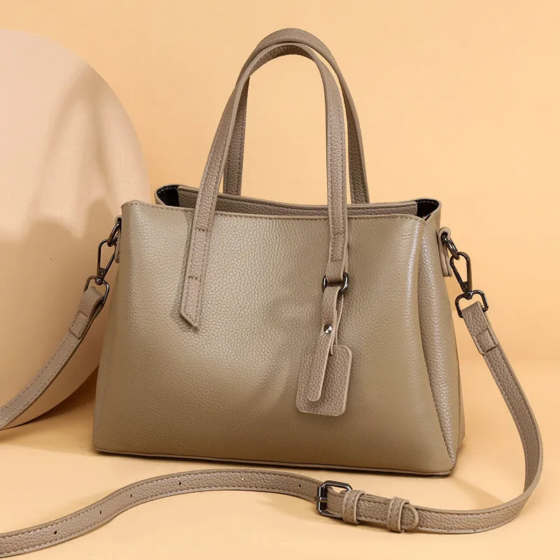 Women's genuine cowhide leather handbag in horizontal square shape with single shoulder strap