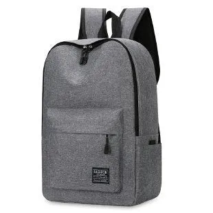 Large black Oxford cloth sports backpack with curved shoulder straps shown on a neutral background
